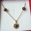 Rayon de Force – Oeil de Tigre & Pendentif Soleil Doré
